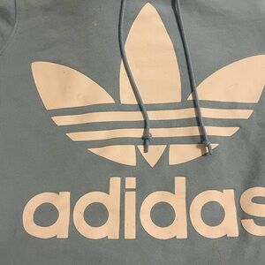 Adidas women Blue hoodie.